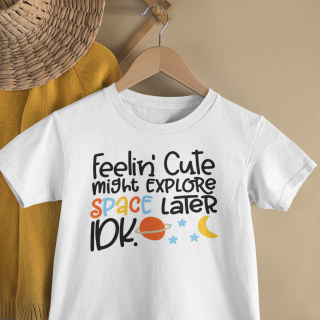 mockup of a kid s t shirt hanging from a wall rack 33736 5