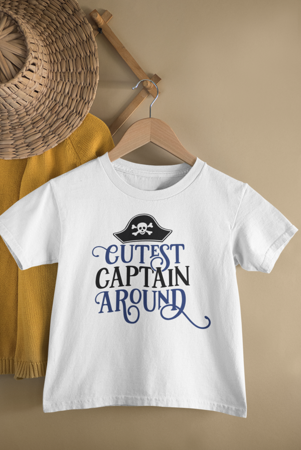 mockup of a kid s t shirt hanging from a wall rack 33736 24